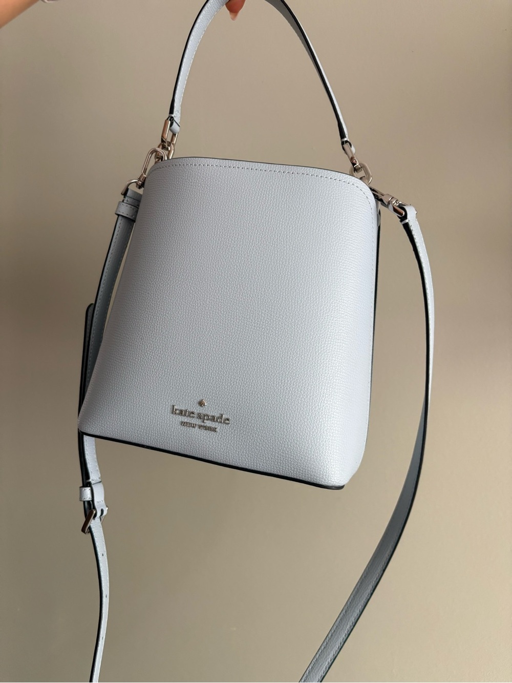 kate spade light gray pebble leather bucket crossbody